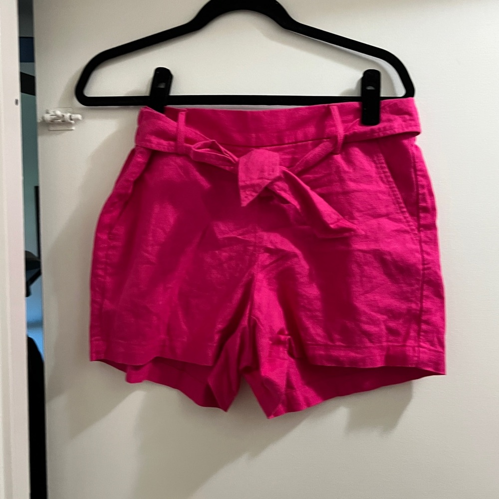 Bright pink belted shorts